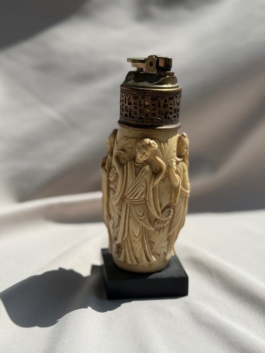 Vintage Asian-Inspired Tabletop Lighter Carved Figural Design on Faux Ivory Resin Ornate Brass Top